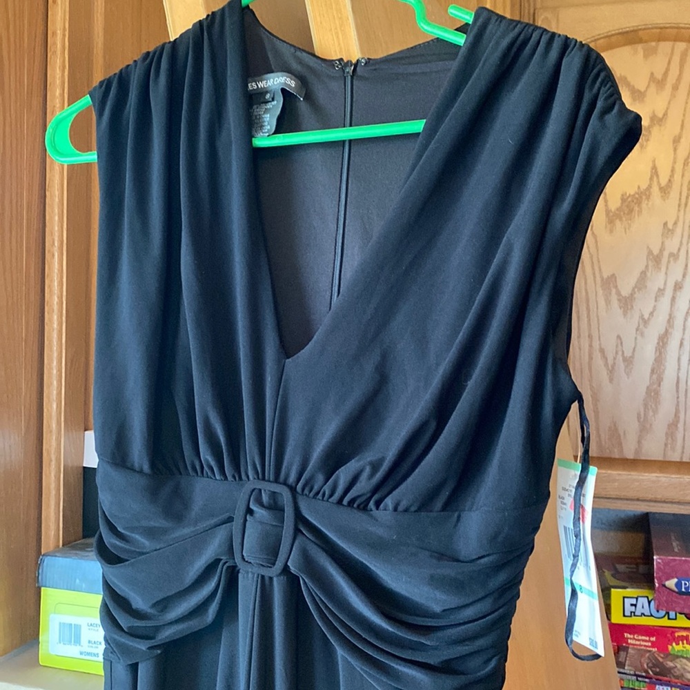 Sleeveless black ruched dress